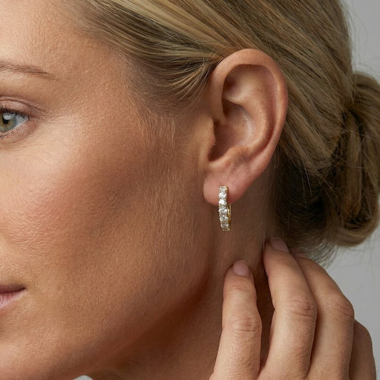 Classic Round Diamond Huggie Earrings in 14K Yellow Gold