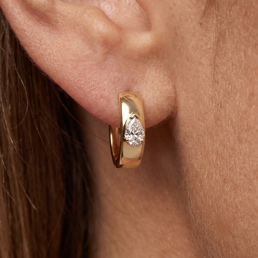Teardrop Pear Shape Diamond Huggie Earrings in 14K Yellow Gold