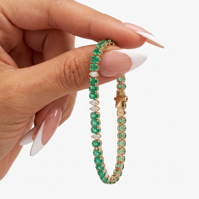 Oval Cut Emerald Line Bracelet in 14K Yellow Gold