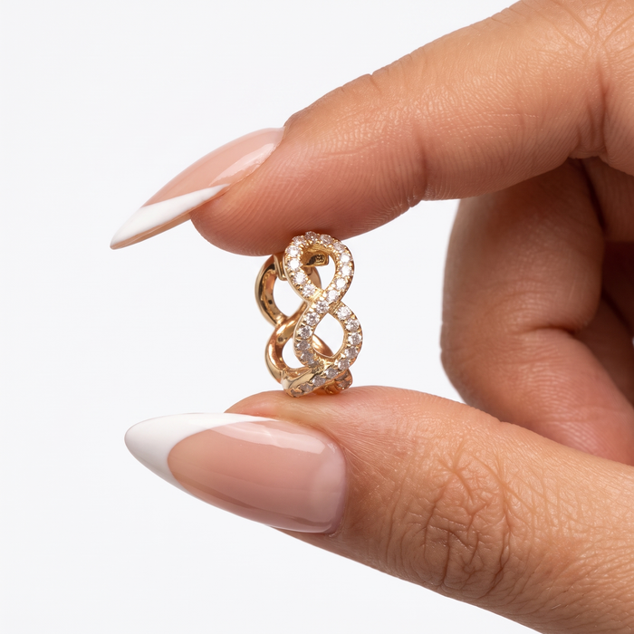 Infinity Twist Diamond Huggie Earrings in 14K Yellow Gold