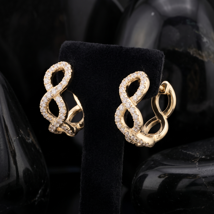 Infinity Twist Diamond Huggie Earrings in 14K Yellow Gold