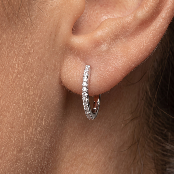 Oval Sleek Diamond Huggie Earrings in 14K White Gold