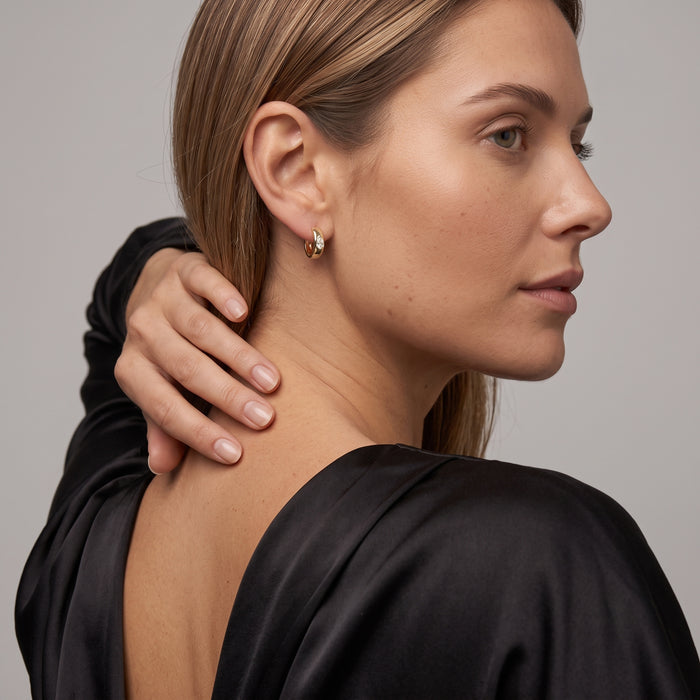 Teardrop Pear Shape Diamond Huggie Earrings in 14K Yellow Gold