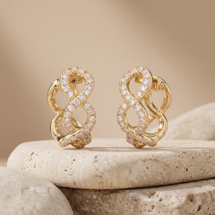 Infinity Twist Diamond Huggie Earrings in 14K Yellow Gold