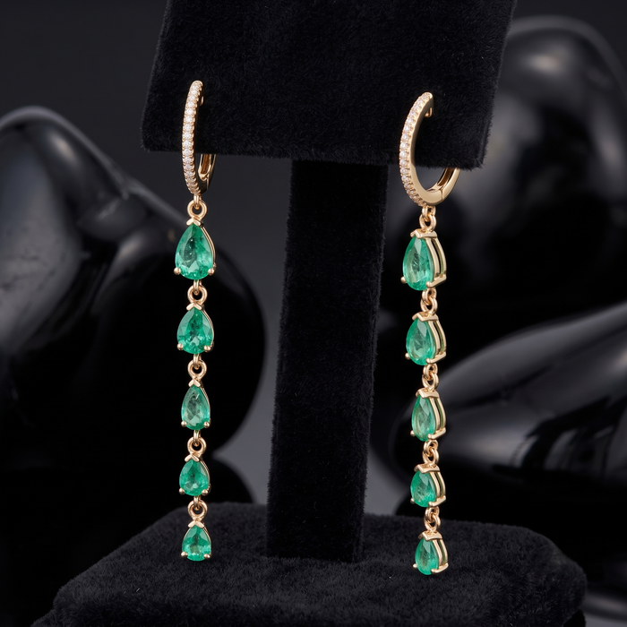 Graduated Pear Cut Emeralds Long Drop Earrings in 14K Gold