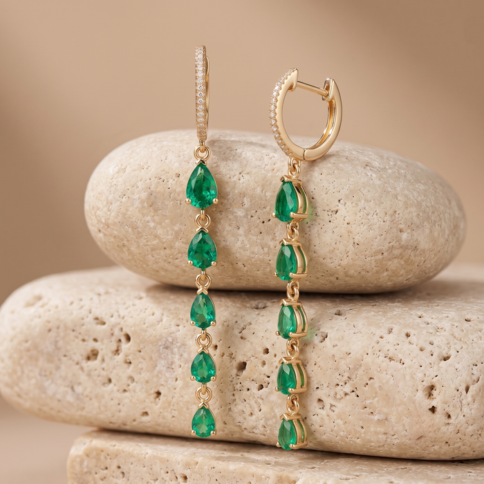 Graduated Pear Cut Emeralds Long Drop Earrings in 14K Gold