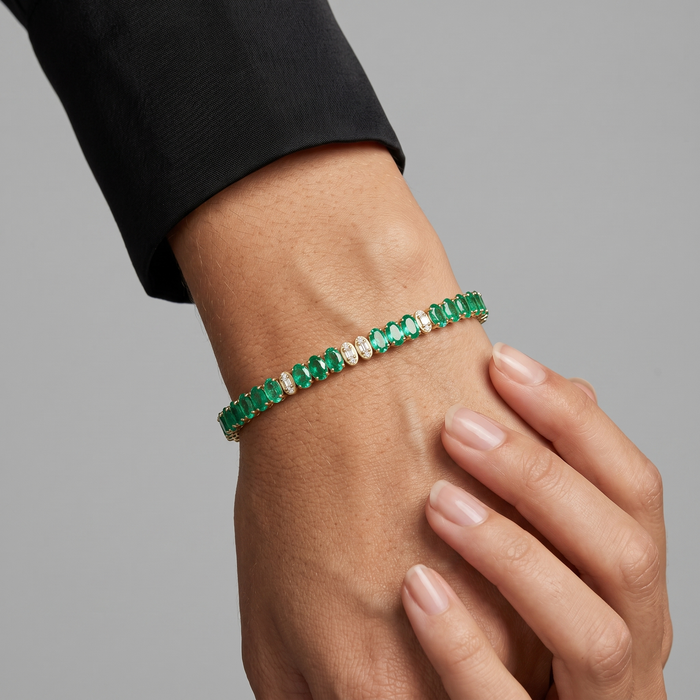 Oval Cut Emerald Line Bracelet in 14K Yellow Gold