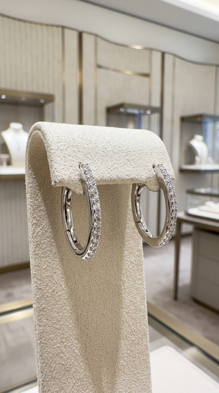 Oval Sleek Diamond Huggie Earrings in 14K White Gold