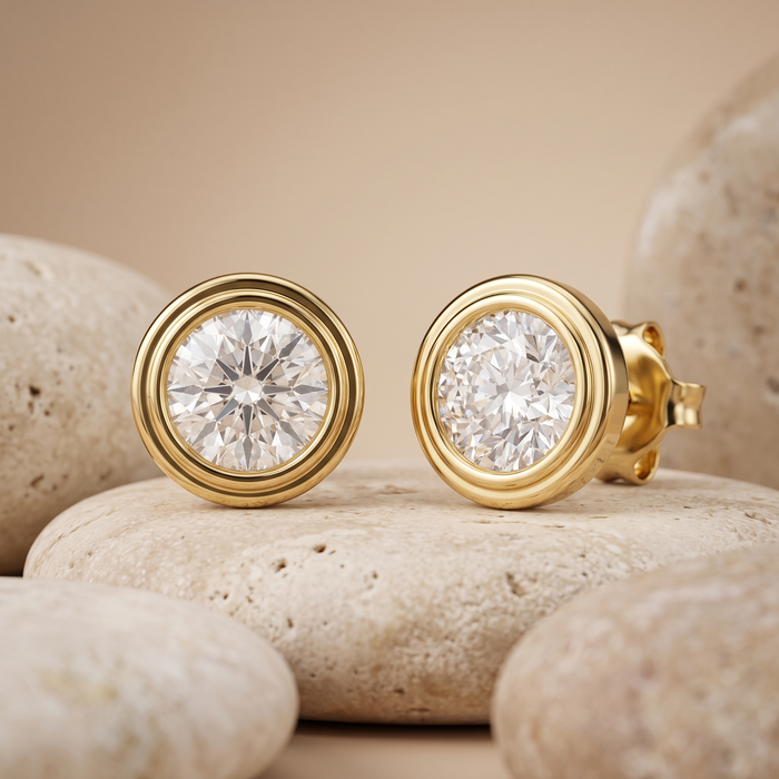 Round Brilliant Bezel Set 18K Yellow Gold Stud Earrings