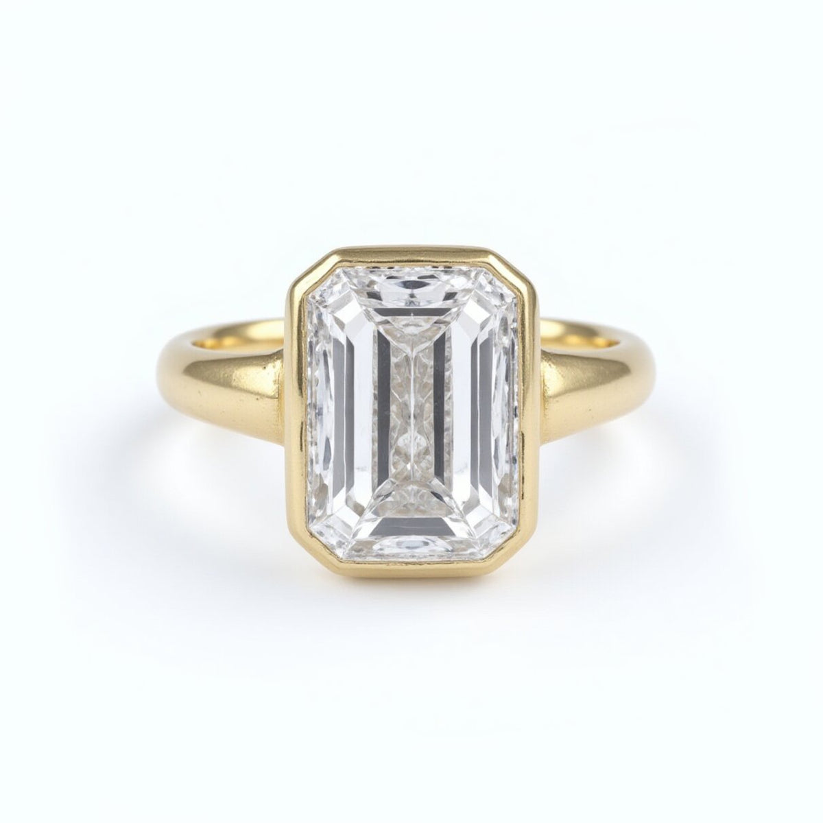 Emerald-Cut Bezel Set Solitaire Ring in 18k