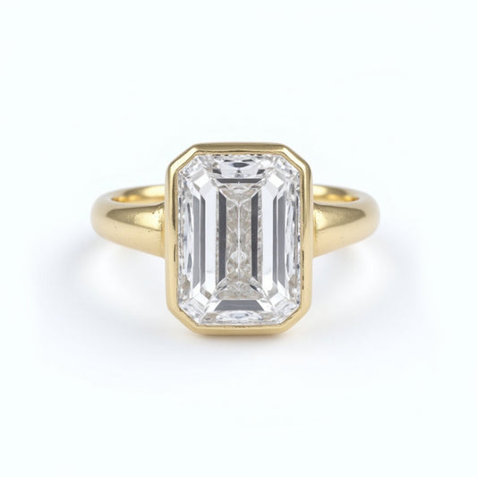 Emerald-Cut Bezel Set Solitaire Ring in 18k