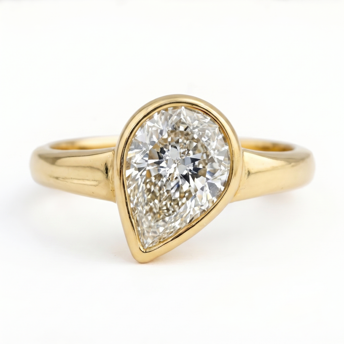 Pear-Shaped Bezel Set Diamond Ring in 14K Yellow Gold