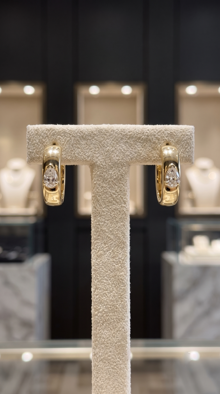 Teardrop Pear Shape Diamond Huggie Earrings in 14K Yellow Gold