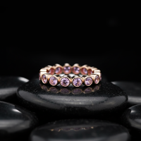 Elegant Round Pink Sapphire 14K Gold Eternity Ring