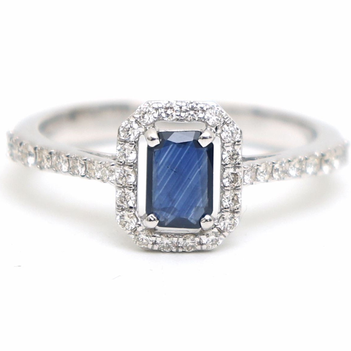 Midnight Elegance Blue Sapphire Halo Ring in 18K White Gold