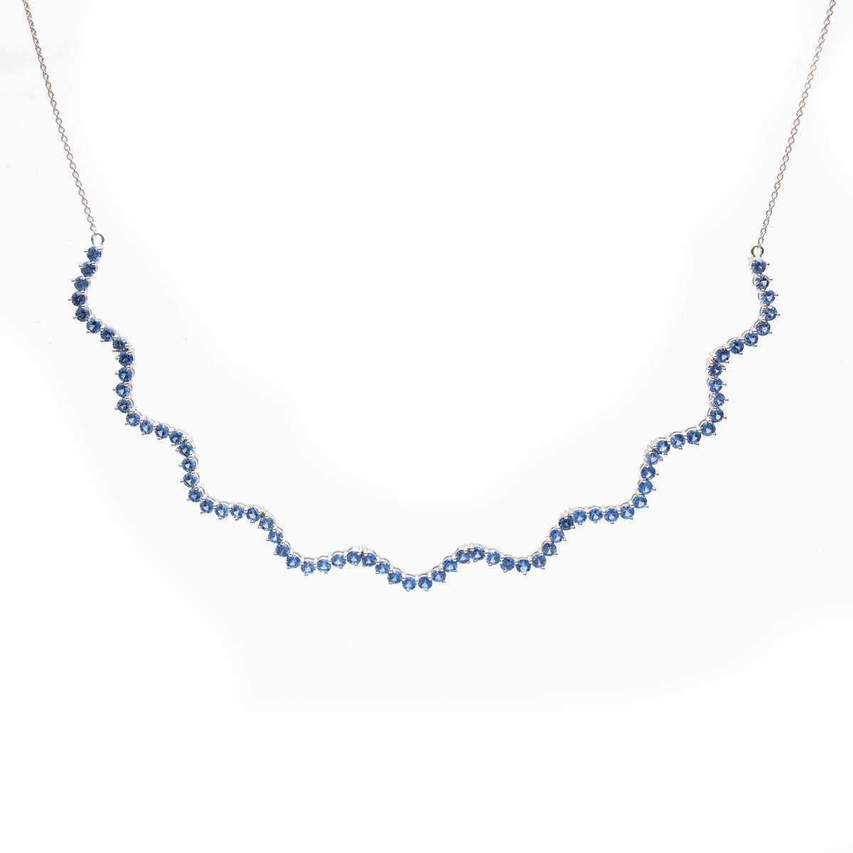 Elegant Blue Sapphire 18K White Gold Wave Necklace