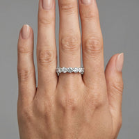 Round Diamond Eternity Shared Prong Ring in 18K Gold