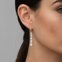 Cascading Pear Shape Drilled Diamonds Drop Earrings in 14K Gold