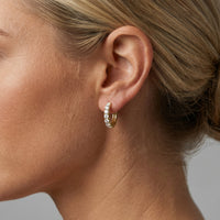 Classic Round Diamond Huggie Earrings in 14K Yellow Gold