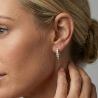 Classic Round Diamond Huggie Earrings in 14K Yellow Gold