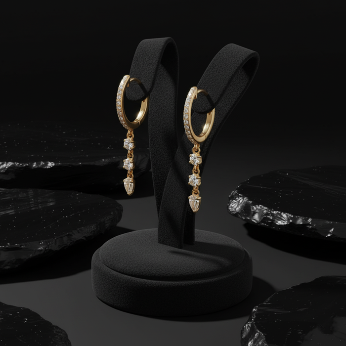 Diamond Pear Drop Huggie Earrings in 14K Yellow Gold