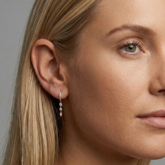 Diamond Pear Drop Huggie Earrings in 14K Yellow Gold