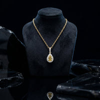 Pear Yellow Diamond Brilliant Halo Necklace in 14K Gold