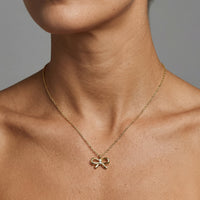 Round Diamond Ribbon Pendant Necklace in 14K Gold