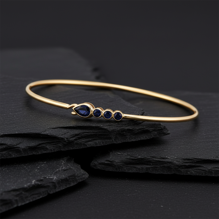 Pear Cut Sapphire Accent Bracelet in 14K Yellow Gold