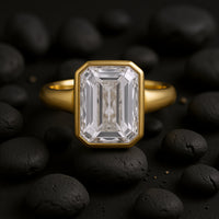 Emerald-Cut Bezel Set Solitaire Ring in 18k