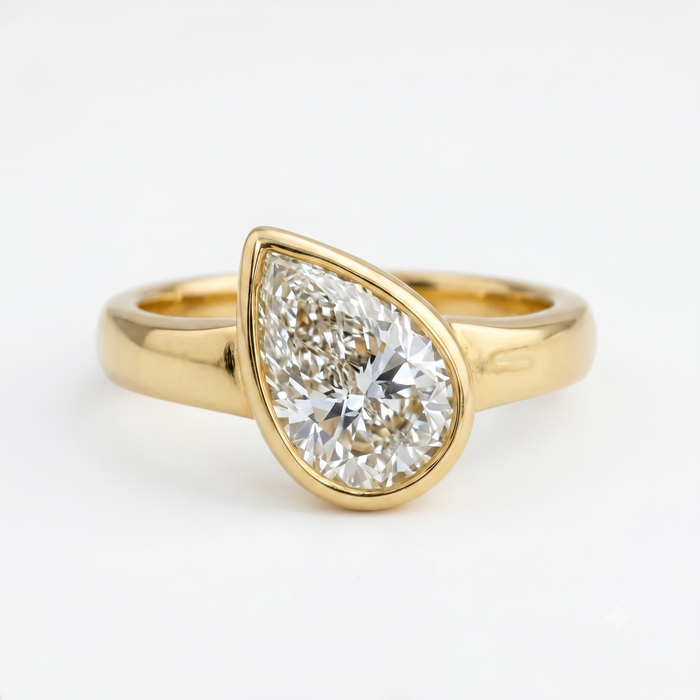 Pear-Shaped Bezel Set Diamond Ring in 14K Yellow Gold