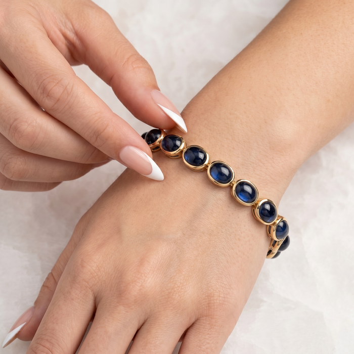 Midnight Oval Sapphire Hoop Earrings in 14K Yellow Gold