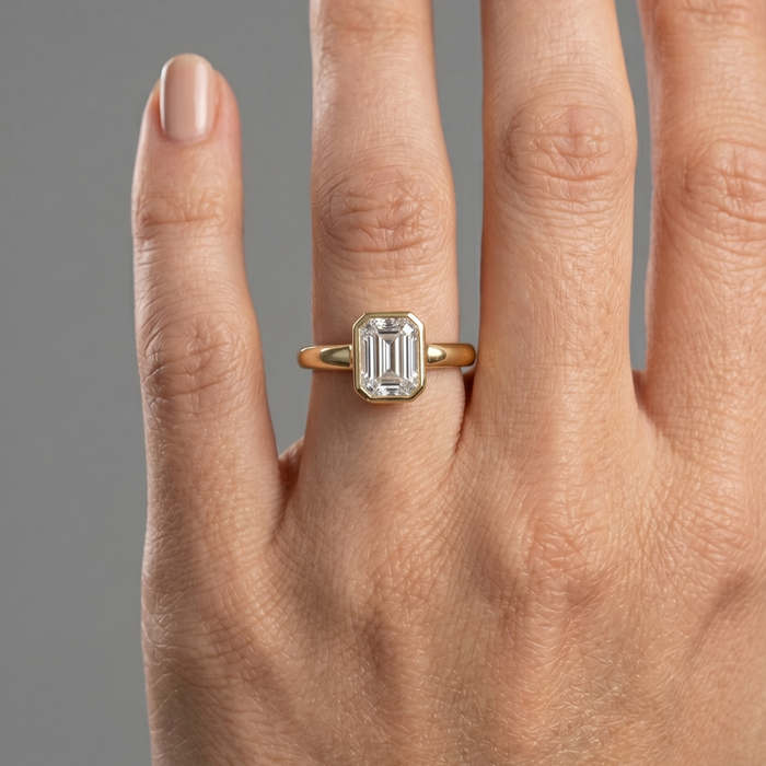 Emerald-Cut Bezel Set Solitaire Ring in 18k