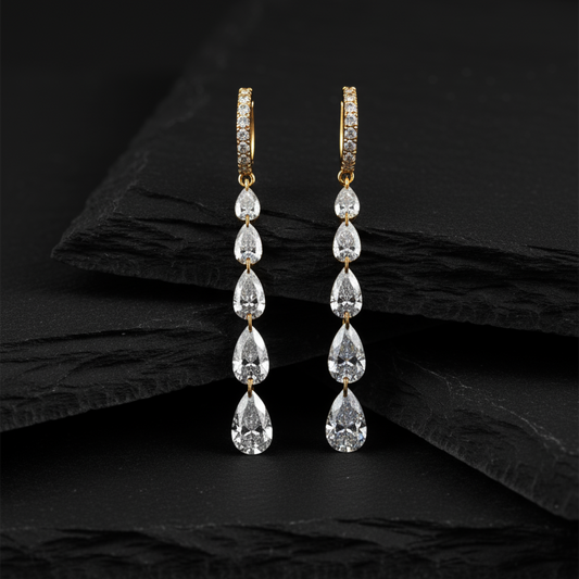 Cascading Pear Shape Drilled Diamonds Drop Earrings in 14K Gold