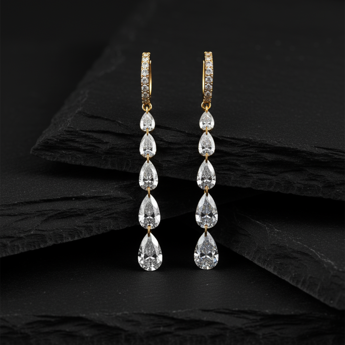 Cascading Pear Shape Drilled Diamonds Drop Earrings in 14K Gold