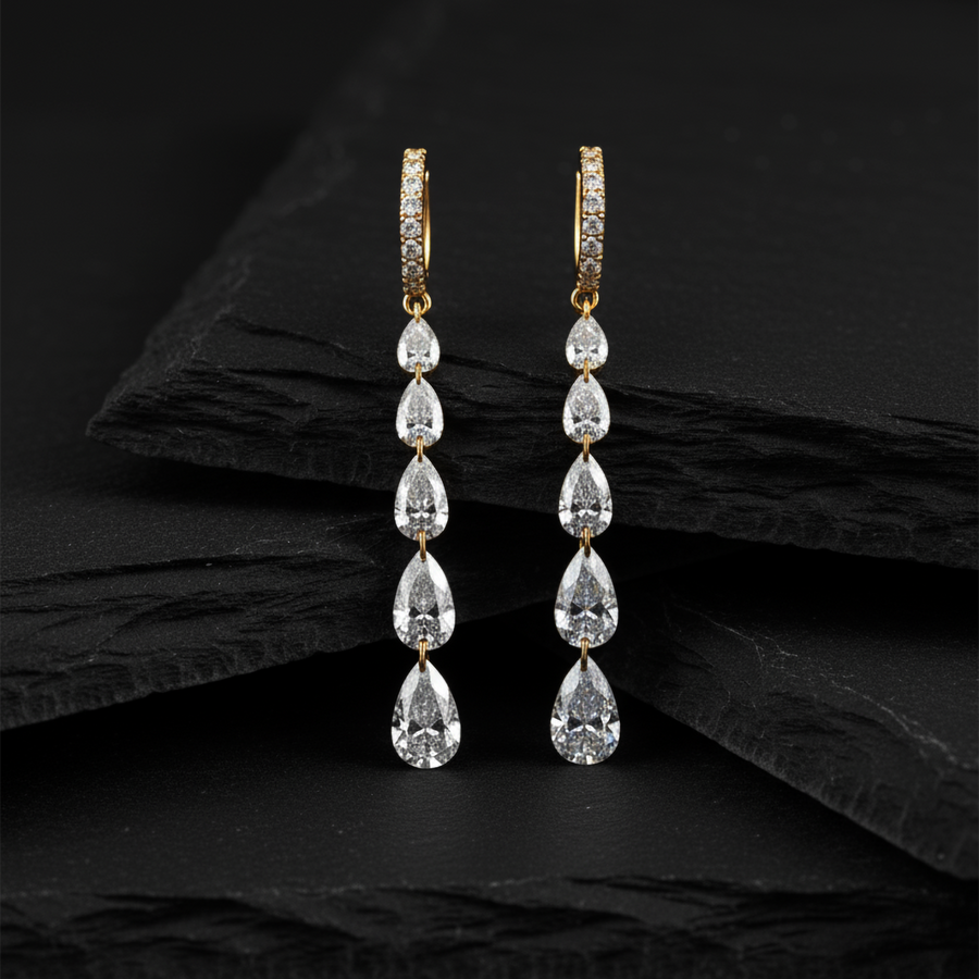 Cascading Pear Shape Drilled Diamonds Drop Earrings in 14K Gold