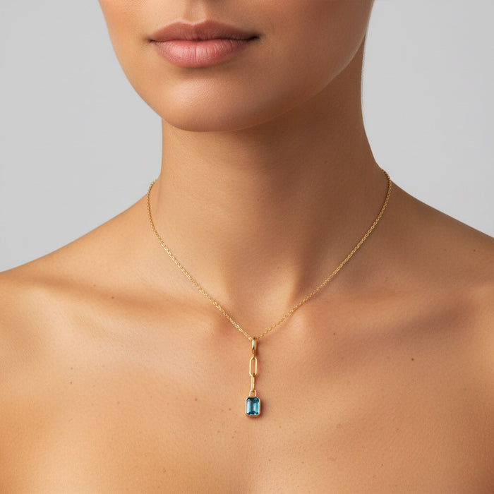 Orbit Blue Topaz Pendant Necklace in 14K Yellow Gold