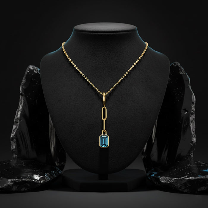 Orbit Blue Topaz Pendant Necklace in 14K Yellow Gold