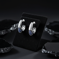 Blue Sapphire Huggie Earrings in 14K White Gold