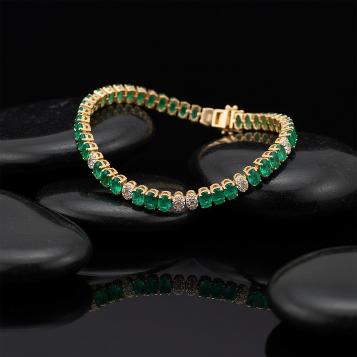 Oval Cut Emerald Line Bracelet in 14K Yellow Gold