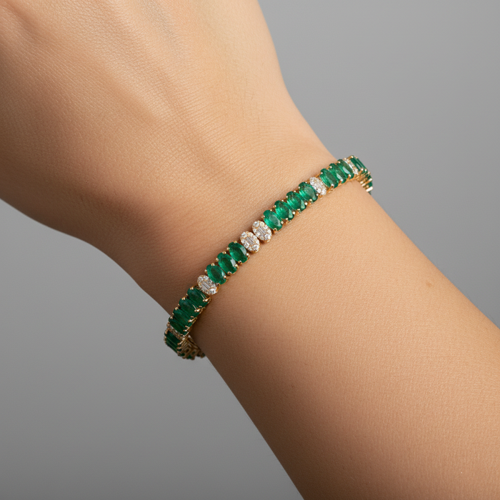 Oval Cut Emerald Line Bracelet in 14K Yellow Gold