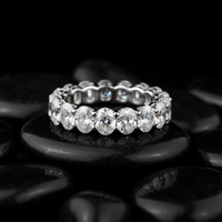 Oval Cut White Diamond Eternity Ring in 18K White Gold