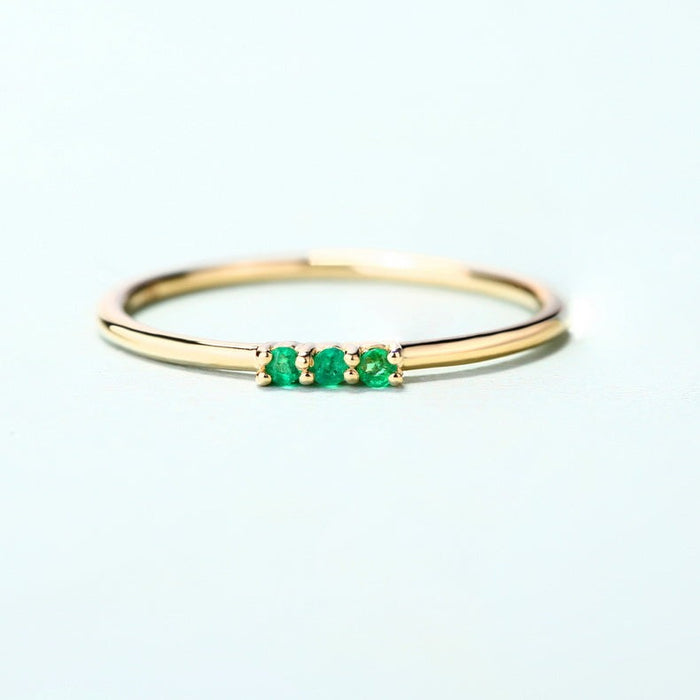 Trilogy Round Emerald Ring in 14K Yellow Gold