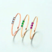 Trilogy Round Emerald Ring in 14K Yellow Gold