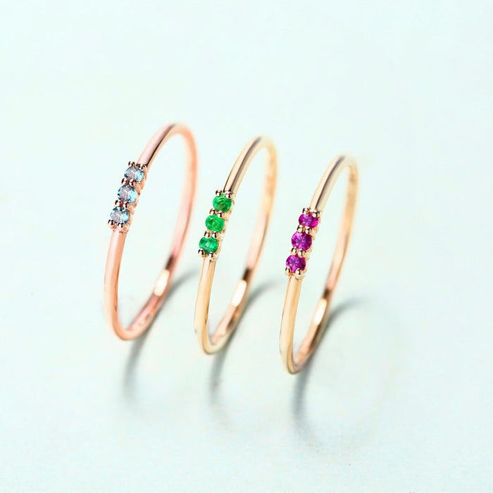 Trilogy Round Emerald Ring in 14K Yellow Gold