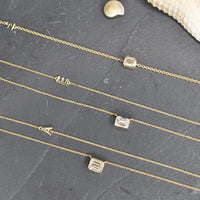 Bezel Set Emerald Cut Diamond Necklace in 18K Gold