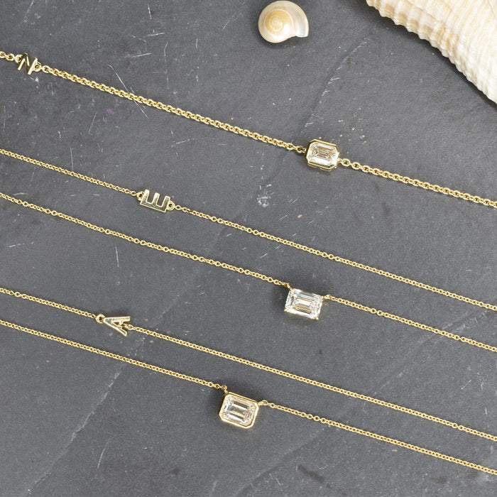 Bezel Set Emerald Cut Diamond Necklace in 18K Gold