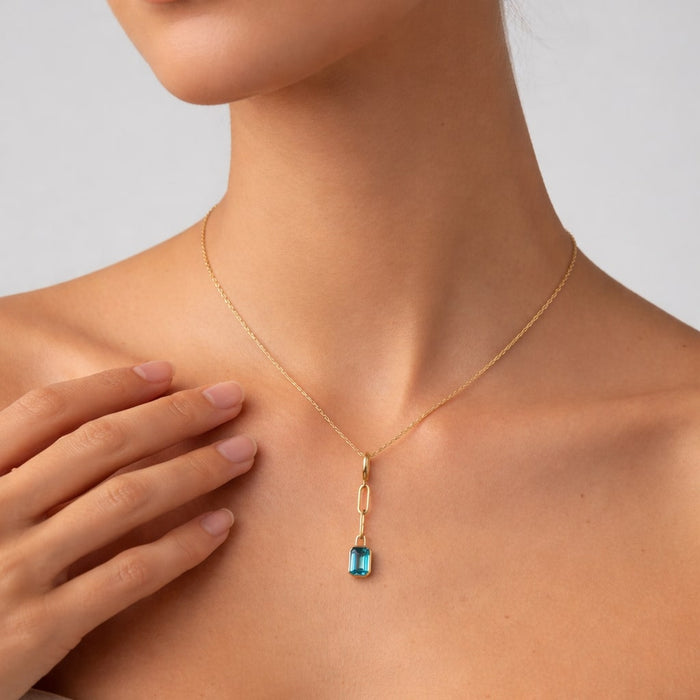 Orbit Blue Topaz Pendant Necklace in 14K Yellow Gold