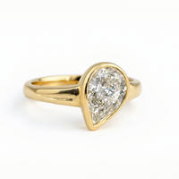 Pear-Shaped Bezel Set Diamond Ring in 14K Yellow Gold