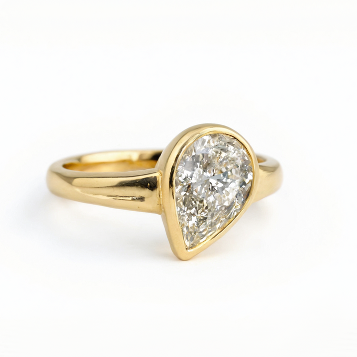 Pear-Shaped Bezel Set Diamond Ring in 14K Yellow Gold